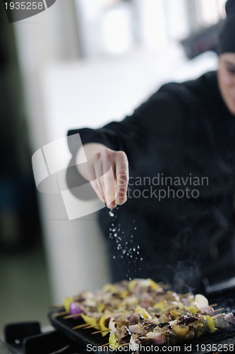 Image of chef preparing meal