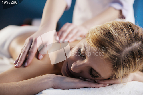 Image of Beautiful young woman in spa