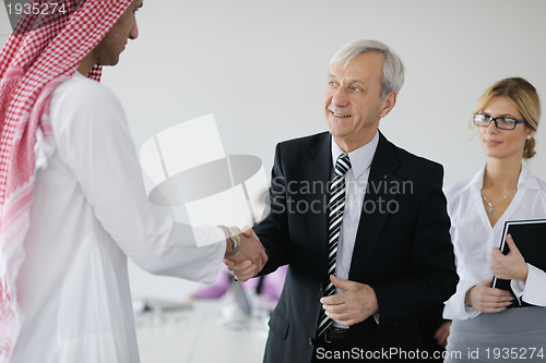 Image of Arabic business man at meeting