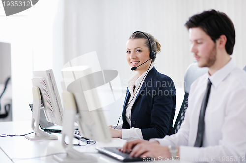 Image of business people group working in customer and help desk office