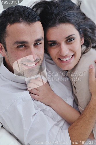 Image of happy young couple relax at home