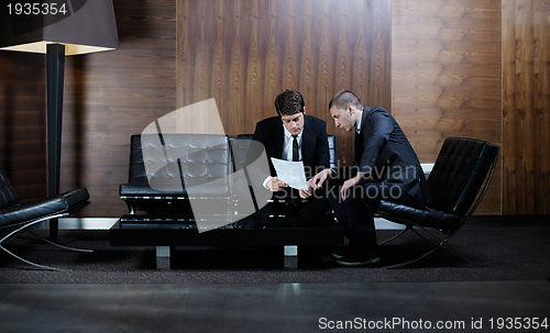 Image of business people making deal