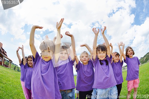 Image of happy kids group  have fun in nature