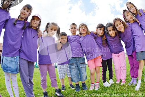 Image of happy kids group  have fun in nature