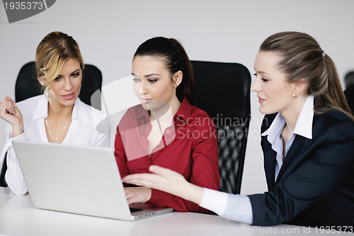 Image of business woman group with headphones