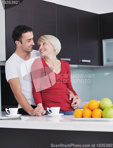 Image of young couple have fun in modern kitchen