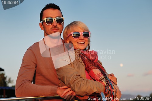 Image of couple in love  have romantic time on boat