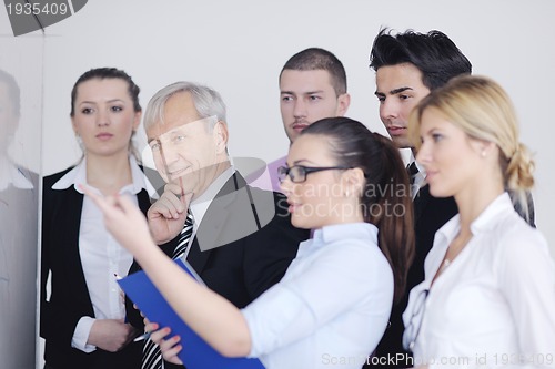 Image of Senior business man giving a presentation