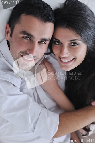 Image of happy young couple relax at home