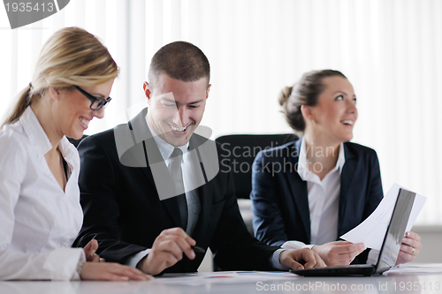 Image of business people in a meeting at office