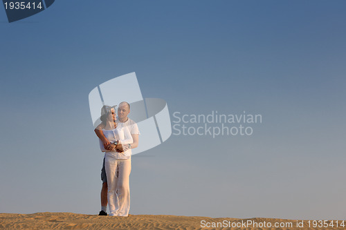 Image of couple enjoying the sunset