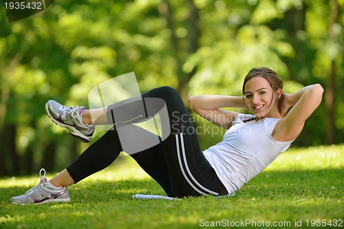 Image of woman stretching before fitness