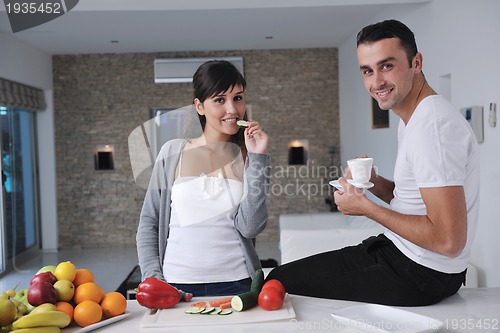 Image of young couple have fun in modern kitchen