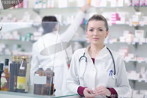 Image of team of pharmacist chemist woman  in pharmacy drugstore