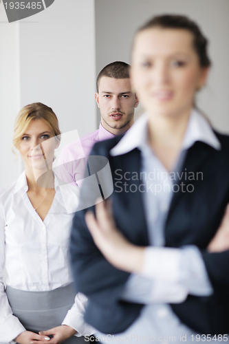Image of Group of young business people at meeting
