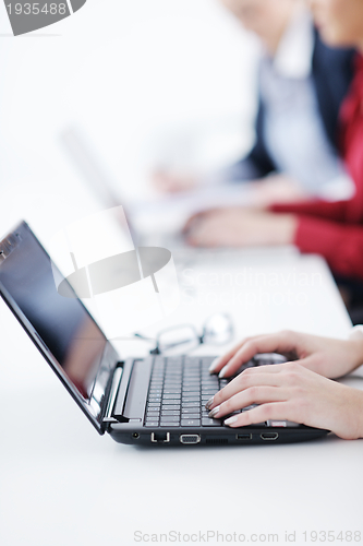 Image of business woman group with headphones