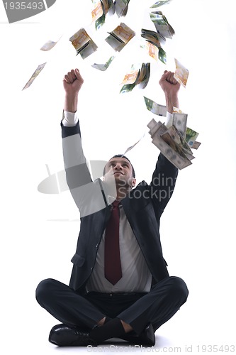 Image of Business man holding money