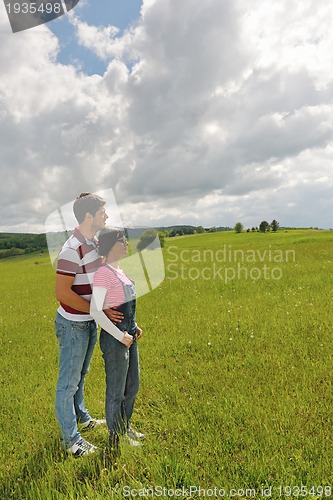 Image of romantic young couple in love together outdoor