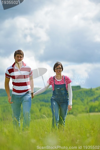 Image of romantic young couple in love together outdoor