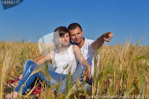 Image of happy couple in wheat field