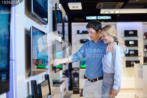 Image of people buy  in consumer electronics store