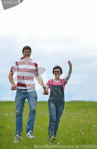 Image of romantic young couple in love together outdoor
