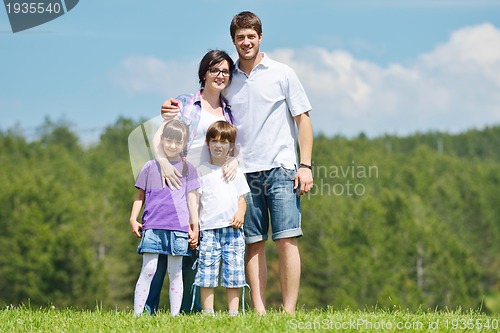 Image of happy young family have fun outdoors