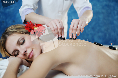 Image of Beautiful young woman in spa