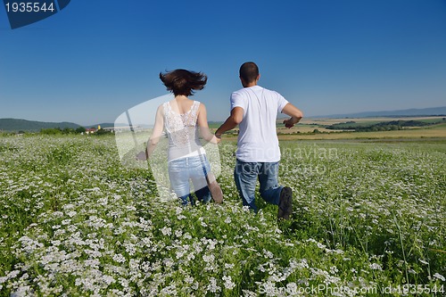 Image of happy couple in wheat field