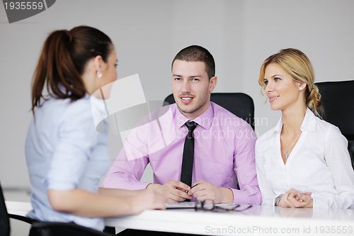 Image of Group of young business people at meeting