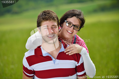 Image of romantic young couple in love together outdoor