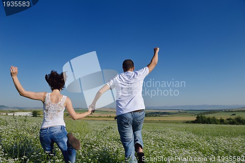 Image of happy couple in wheat field