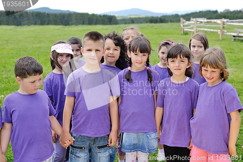 Image of happy kids group  have fun in nature