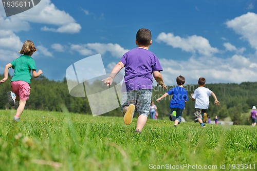 Image of happy kids group  have fun in nature