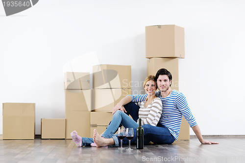Image of Young couple moving in new house