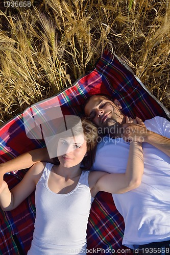 Image of happy couple in wheat field