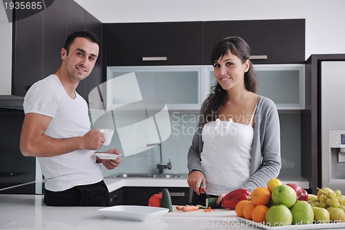 Image of young couple have fun in modern kitchen