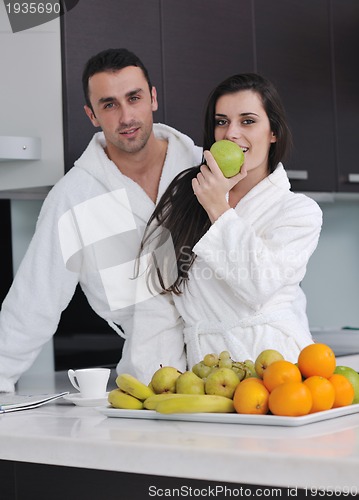 Image of young couple have fun in modern kitchen