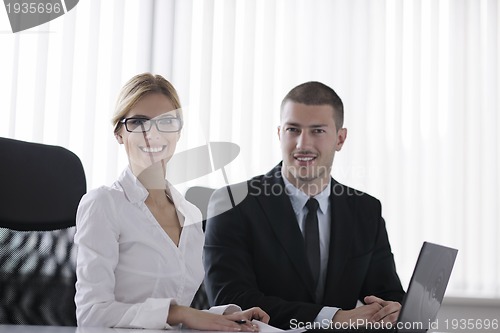 Image of business people in a meeting at office