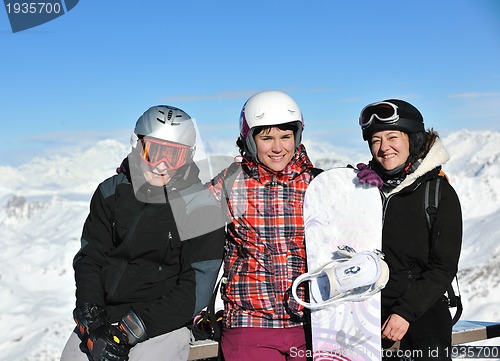 Image of people group on snow at winter season