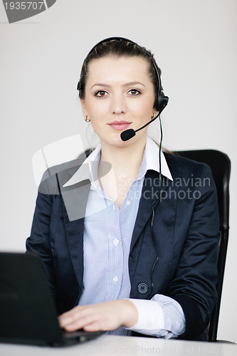 Image of business woman group with headphones