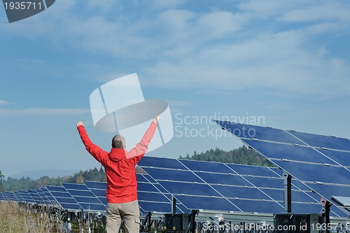 Image of Male solar panel engineer at work place