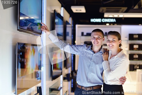 Image of people buy  in consumer electronics store