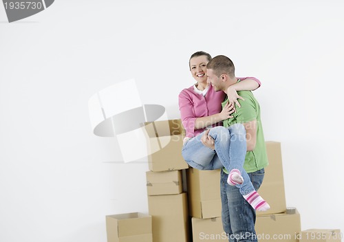 Image of Young couple moving in new home