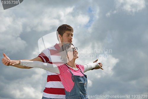 Image of romantic young couple in love together outdoor