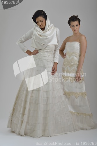Image of portrait of a three beautiful woman in wedding dress