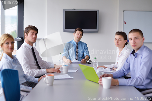 Image of business people in a meeting at office