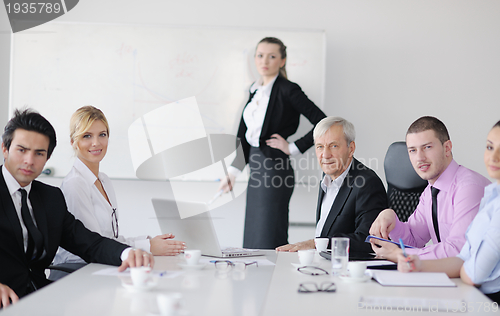 Image of Group of young business people at meeting
