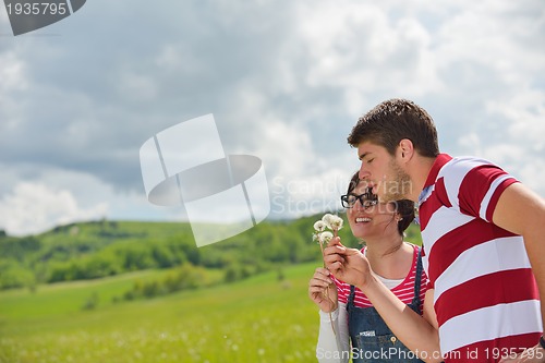 Image of romantic young couple in love together outdoor