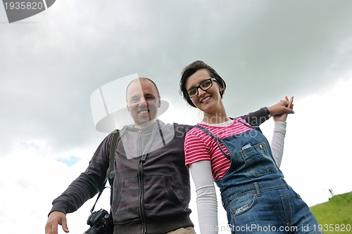 Image of romantic young couple in love together outdoor